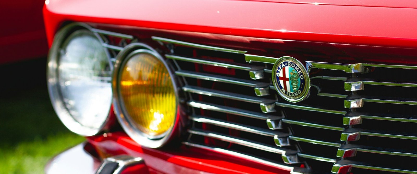 Vintage grill of red Alfa Romeo classic car