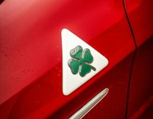 The History Behind Alfa Romeo’s Quadrifoglio: Why This Symbol Dominates Our Merchandise